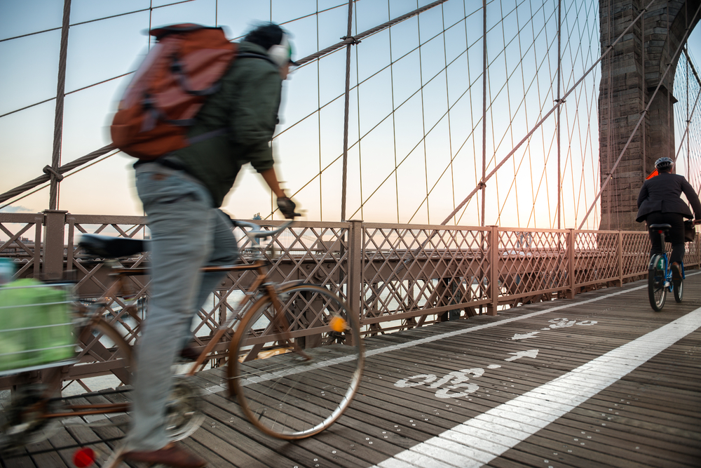 Biking across bridge in New York