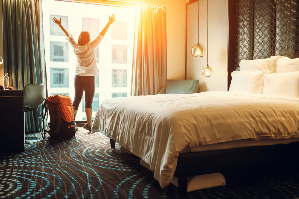 Woman in Hotel Room Window